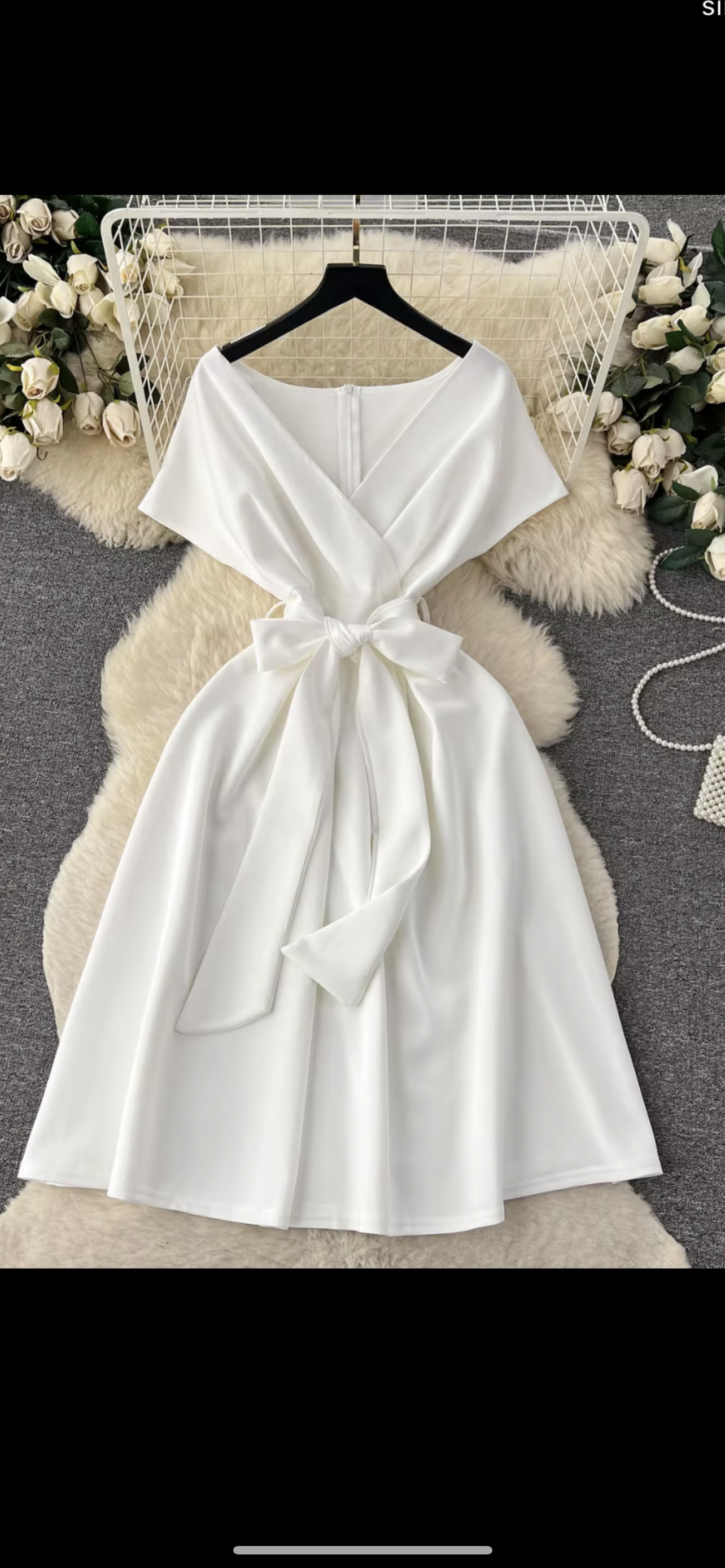 Robe  évasée Mariette avec  un noeud constituer par un fil