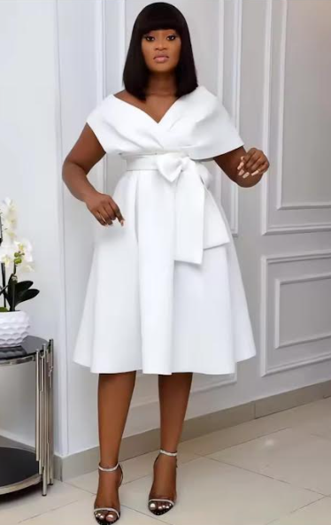 Robe  évasée Mariette avec  un noeud constituer par un fil